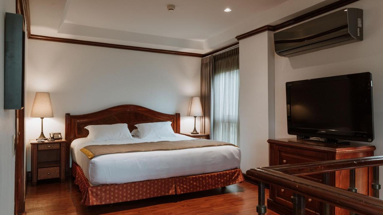 Hotel Park10 Medellín Kültér fotó A bedroom at the hotel